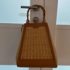 J. McLaughlin wood, wicker and leather handbag.